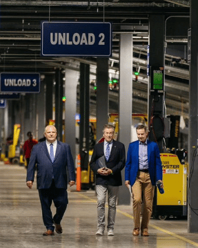 Premier Doug Ford and Toronto Mayor John Tory tour a new Purolator plant in Scarborough.
